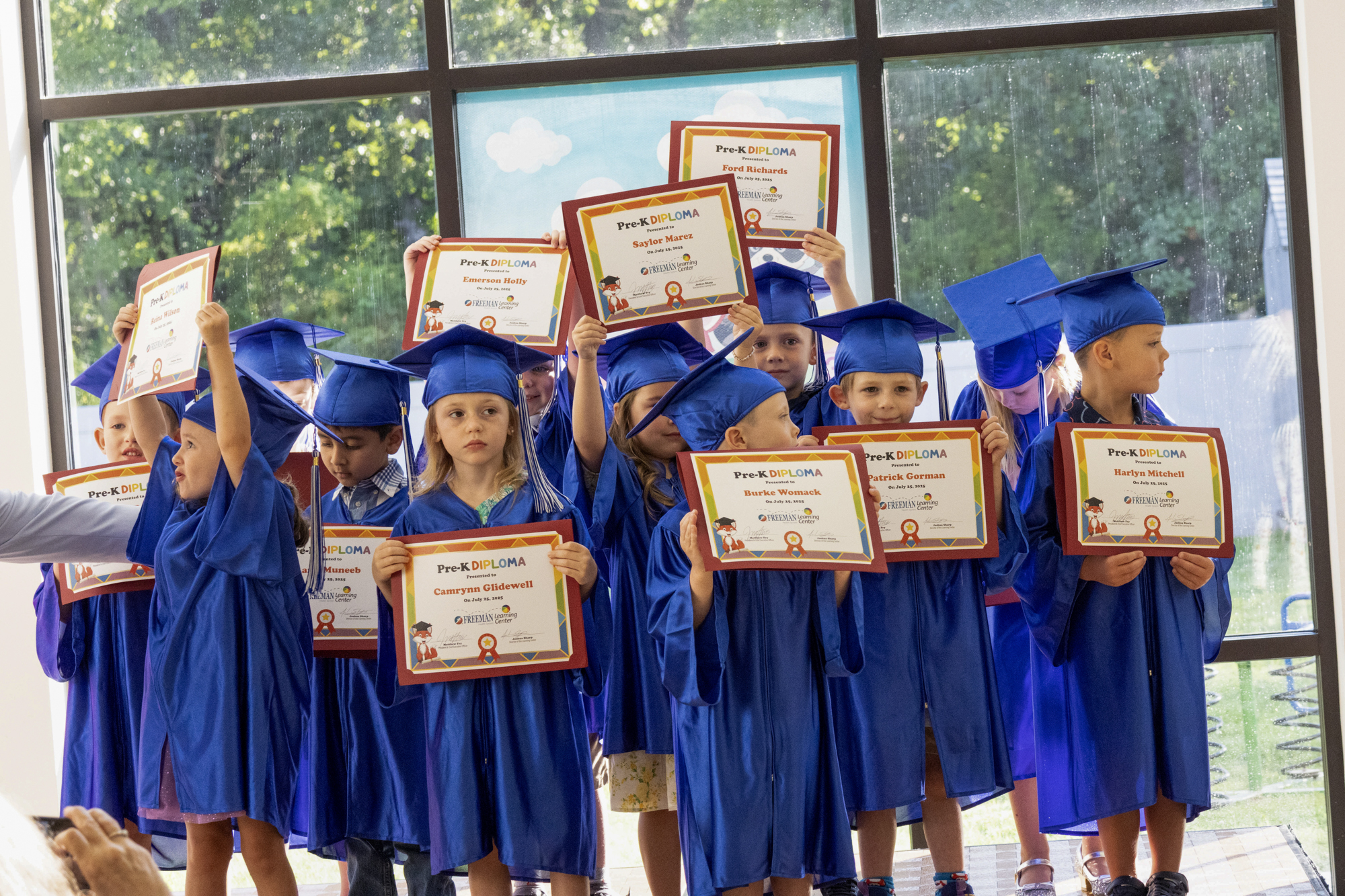diplomas in hand diplomas in hand