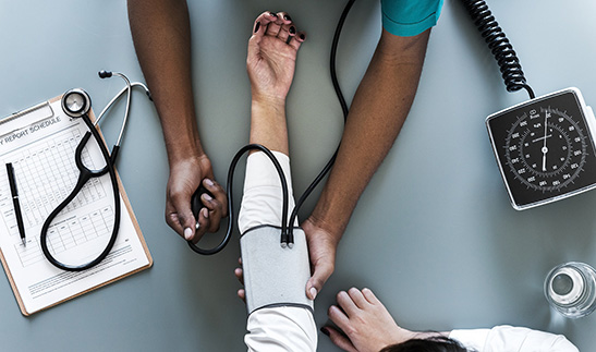 Woman checking blood pressure Woman checking blood pressure