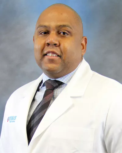 Enock E. Faustin, MD