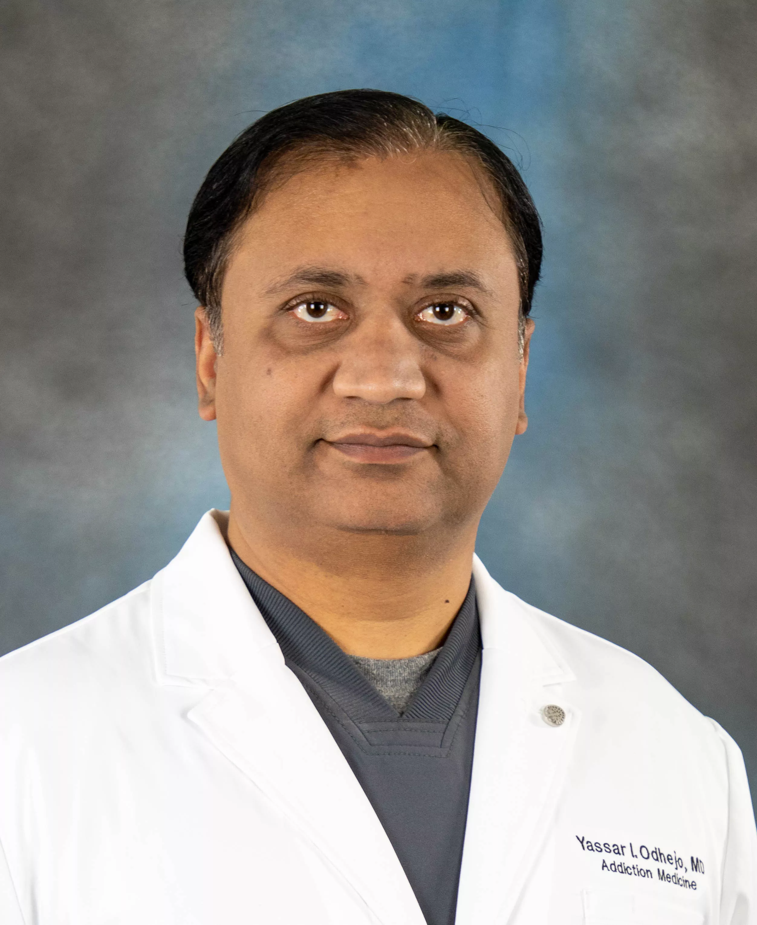 Dr. Yassar Odhejo