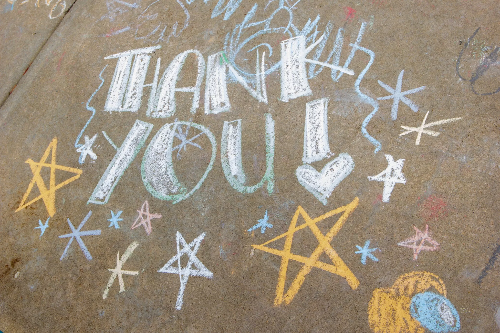 Elementary School Children Chalk Inspirational Messages at Freeman
